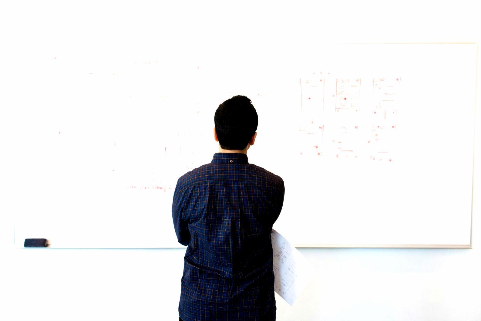 Workshop participant reviewing personal financial priorities